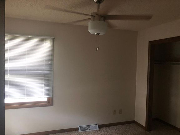 BEDROOM #1 TO THE FRONT OF THE HOUSE WITH NEW LIGHT CEILING 