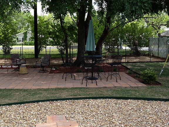 Dog Run Behind Paver Patio