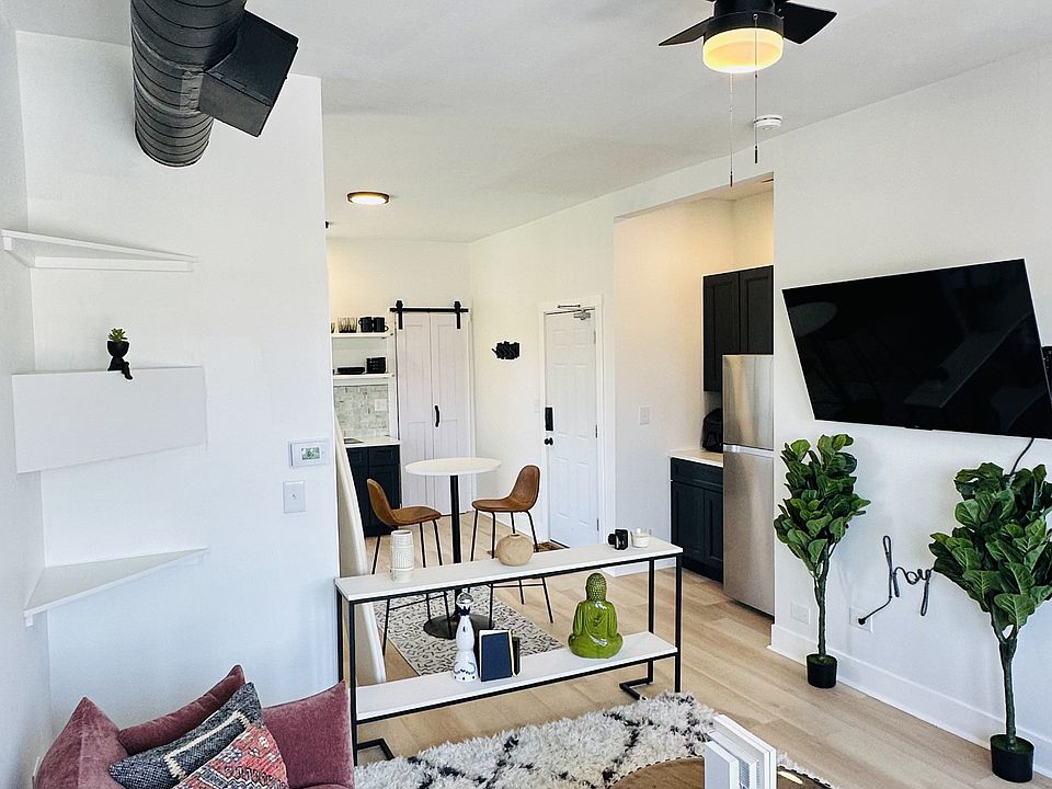Furnished living space with abundant natural light