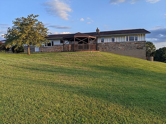 back of home with gazebo