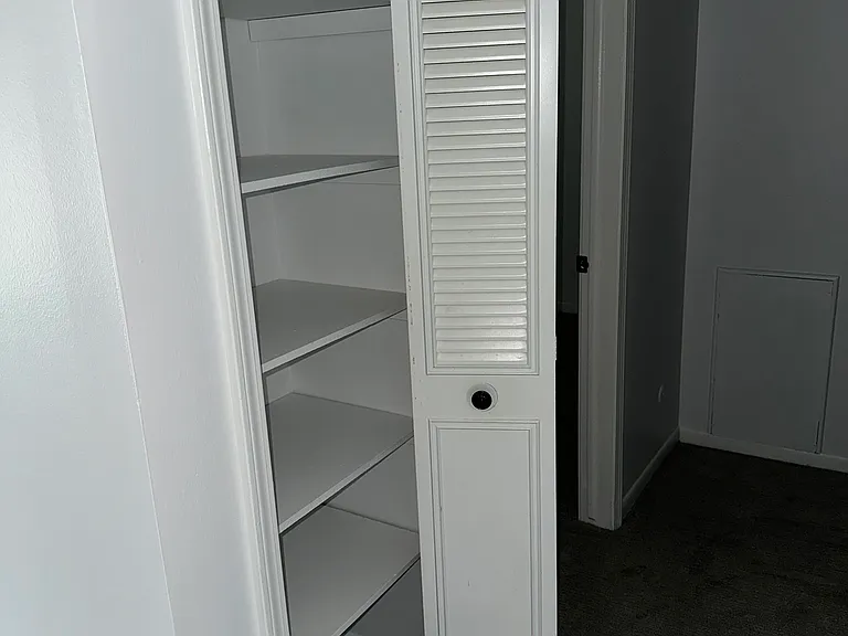 Hallway Closet - Doors open