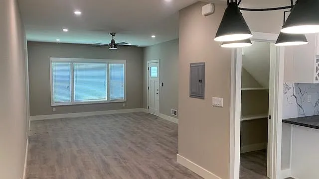 View of living room, walk-in pantry on the Right, as seen from the dining area