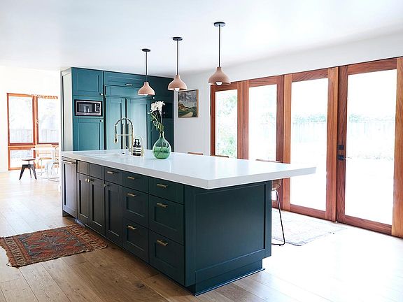 Sliding door fully opens to the backyard and pool