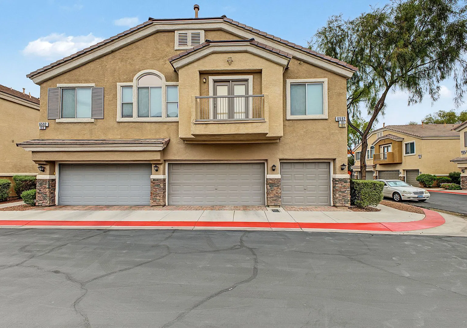 Charming 2-Bedroom Condo with Attached Garage in Gated Community! — Photo 1
