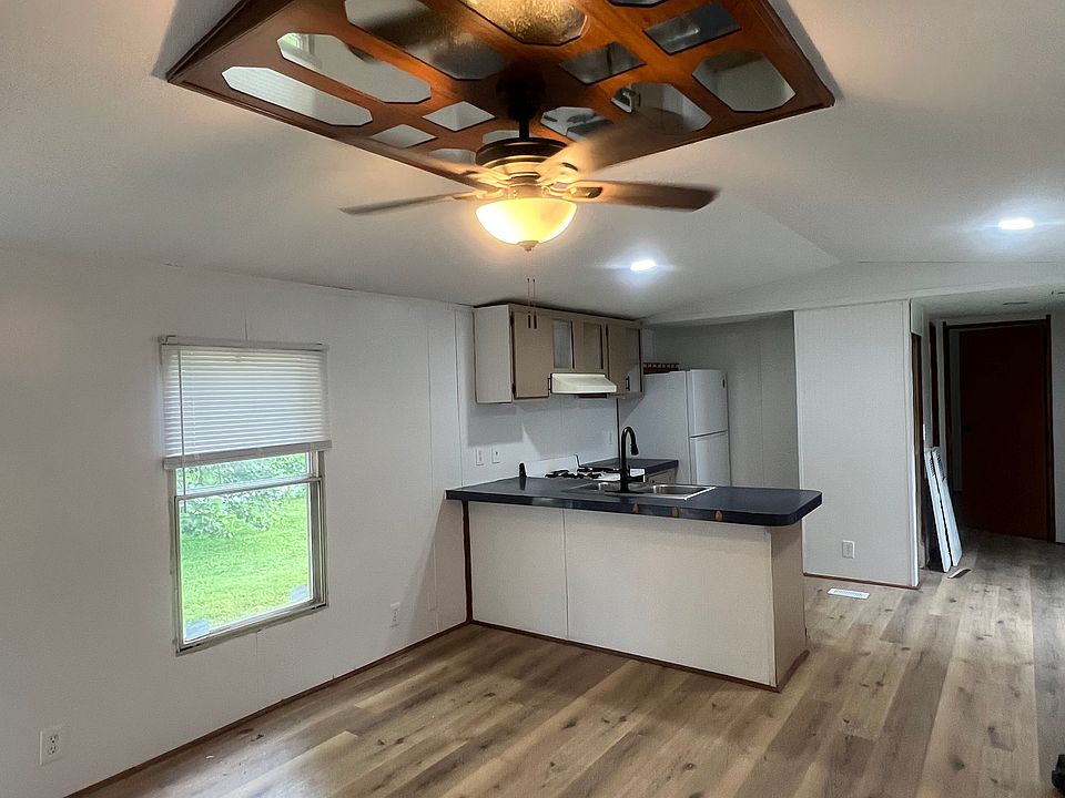 Looking at living room into kitchen.