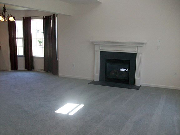 living room w/ gas fireplace