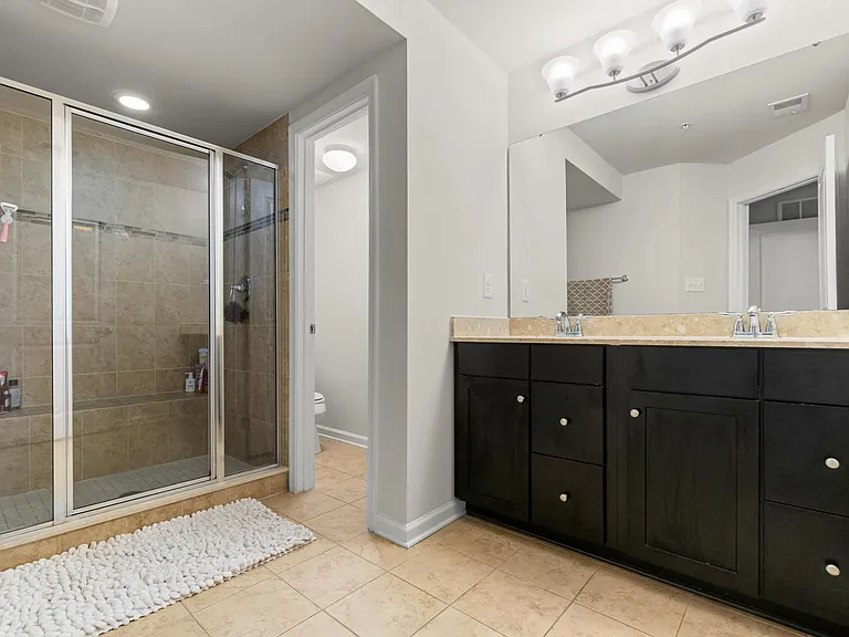 Master bath with dual sinks and dual showers