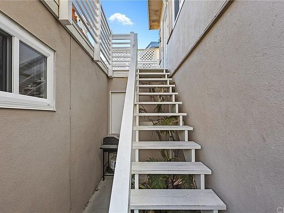 Take the back, upstairs stairs to your home.