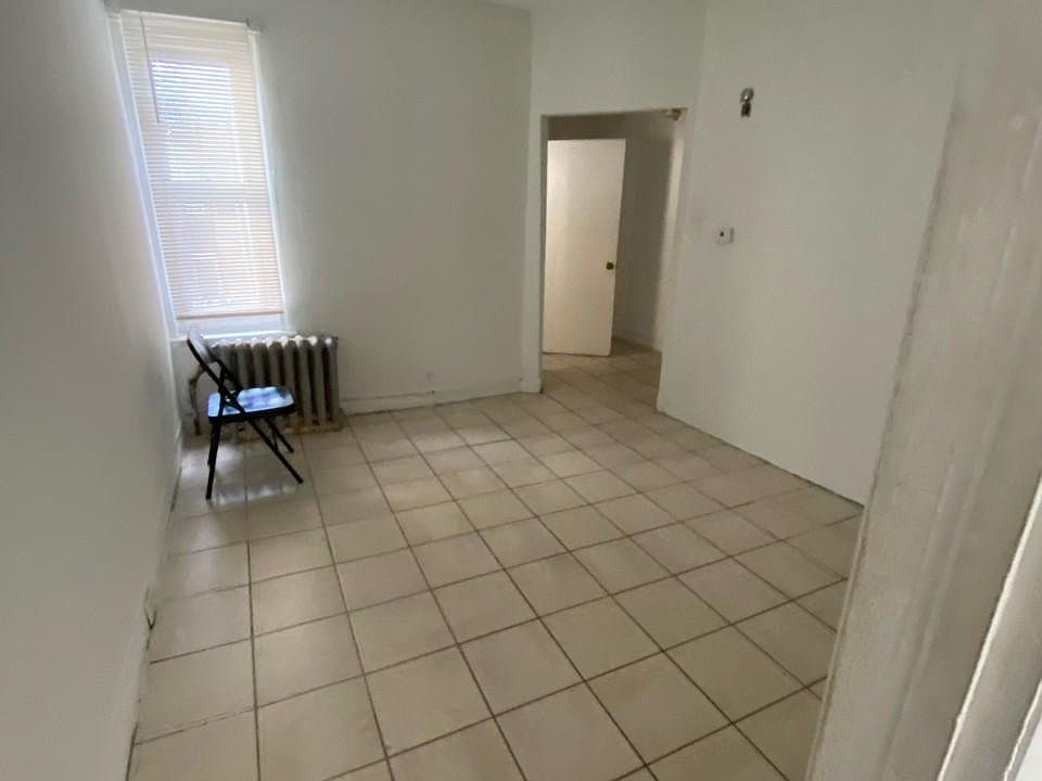 Entrance to apartment and living area.