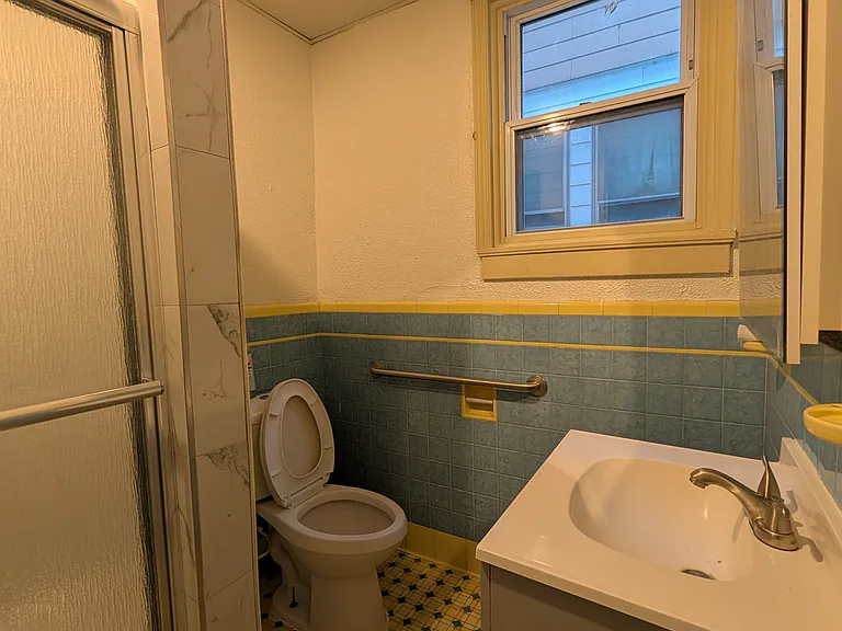 Restoom sink + Toilet view