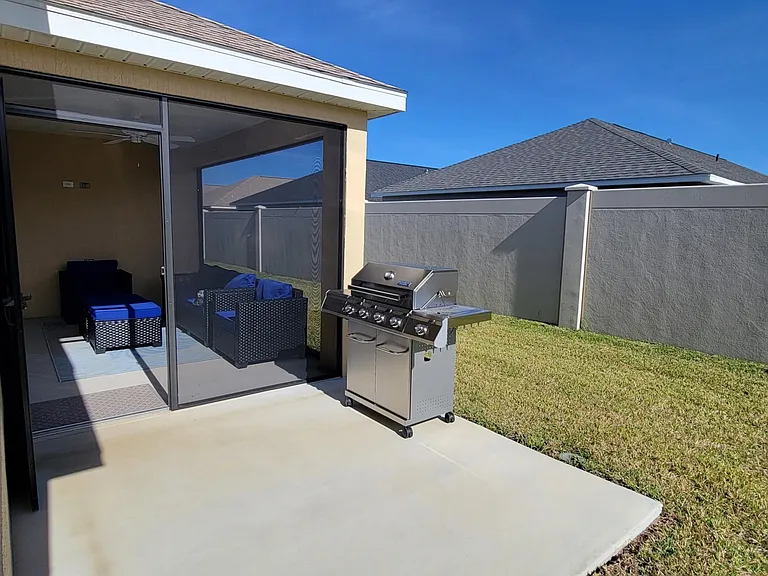 Backyard Concrete Patio is for your BBQ/Grilling needs.