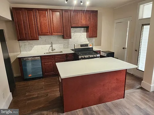 4621 Woodland Ave — Photo 7