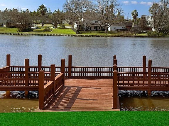 Enjoy fishing for bass or watching the serene sunset from the dock.