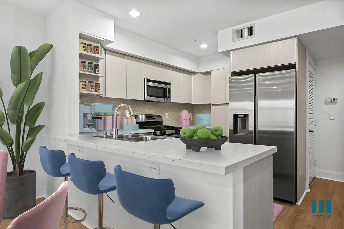 Open-Concept Kitchen with Energy-Efficient Appliances and Countertop Bar - 1539 Beloit Ave