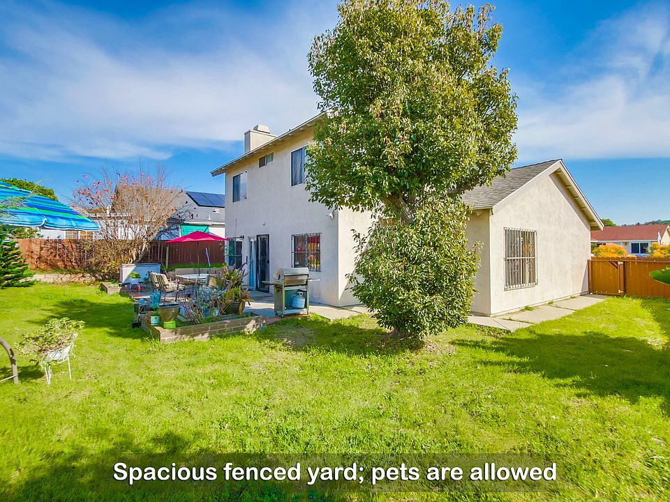 Your furry friends will love playing around on the grass in this fenced yard
