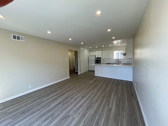 Kitchen and Living room with recessed lighting