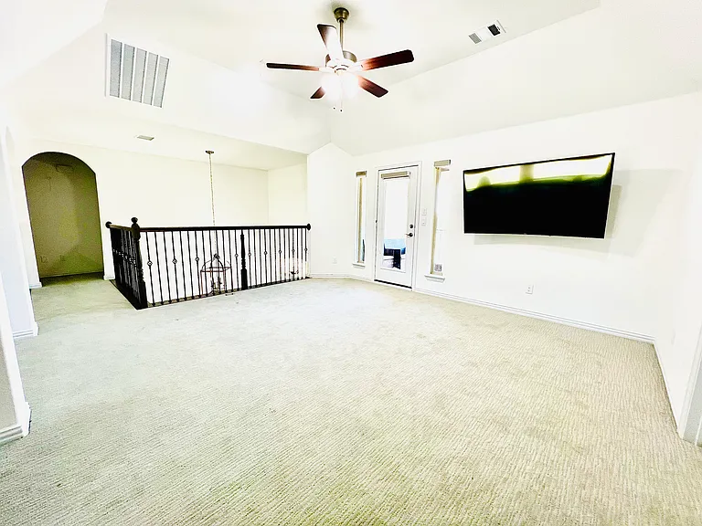 Game room with direct access to a balcony offering stunning lake views