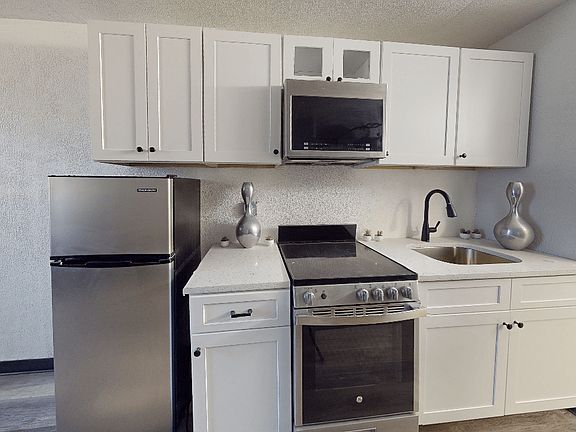 My Home at Macon | Renovated Kitchens w/ White Cabinets Stainless Steel Appliances