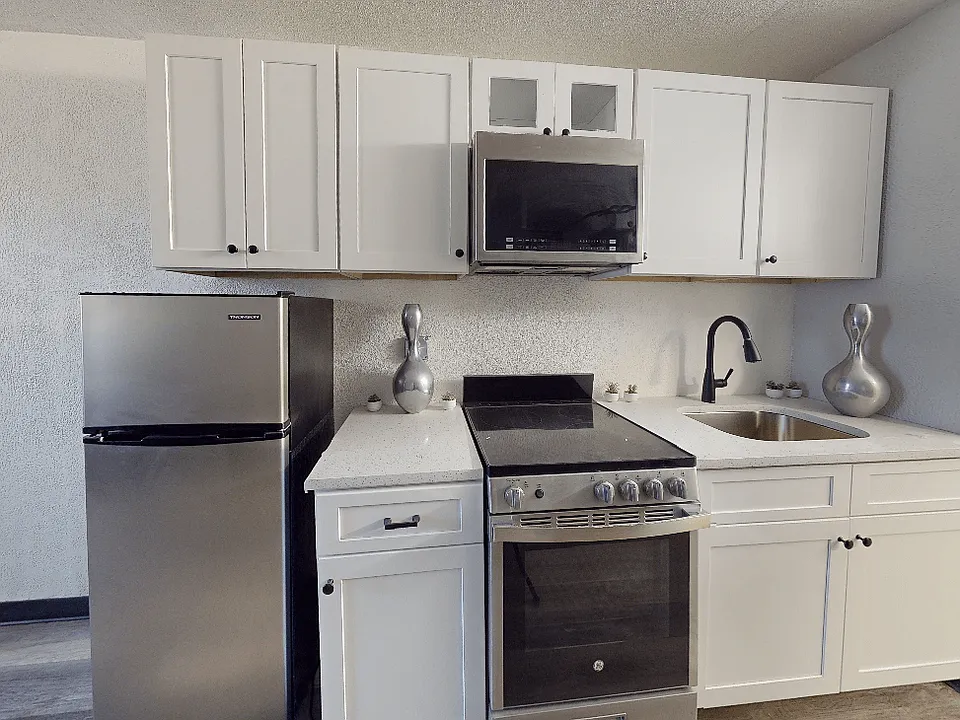 My Home at Macon | Renovated Kitchens w/ White Cabinets Stainless Steel Appliances