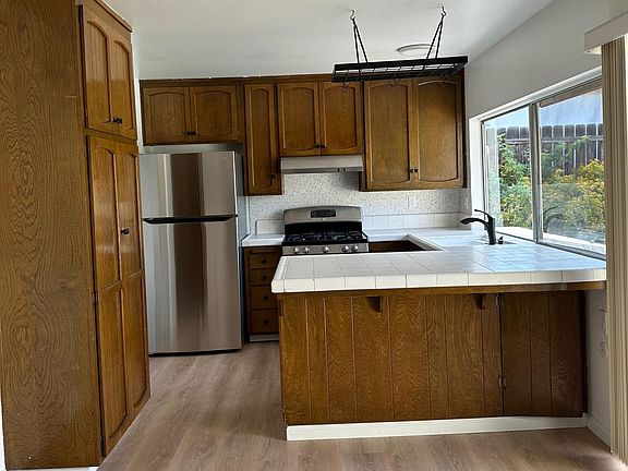 Kitchen and Dining Area in Foreground