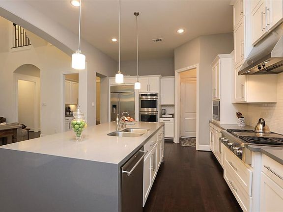 Light and Bright throughout! Huge island! Stainless appliances! Commercial like appliances!