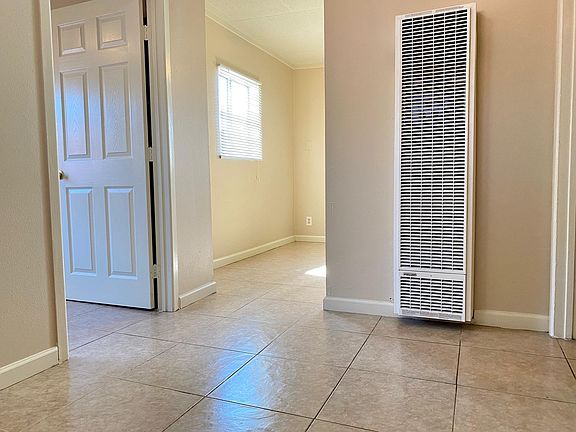 Additional view of dining area out to living room