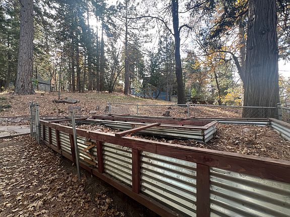 Side yard raised garden bed.