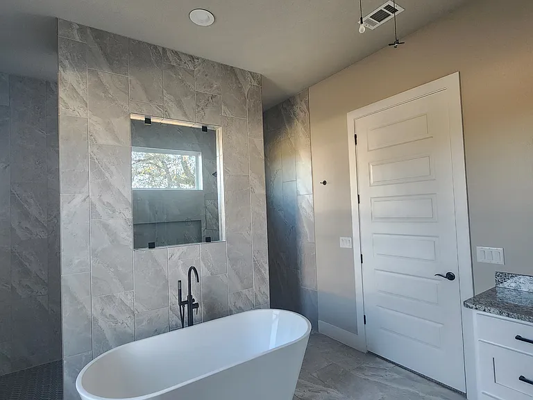 Mstr Bath and walk-in shower behind tub