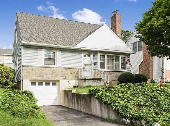 Another front view with picture of oversized 2 car tandem garage