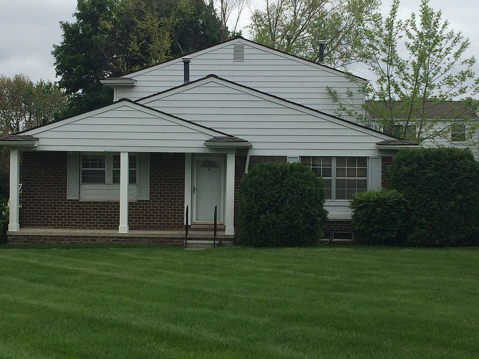 End unit with large porch over looking yard