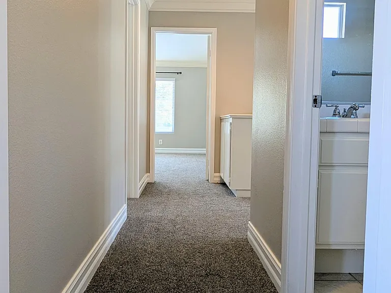 Hallway from bedroom 4 to master