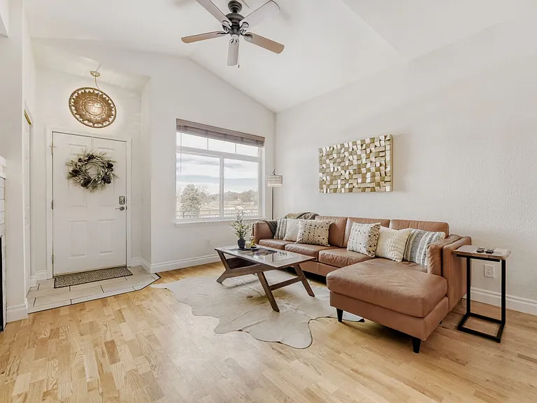 Living room with gas fireplace and 55" TV
