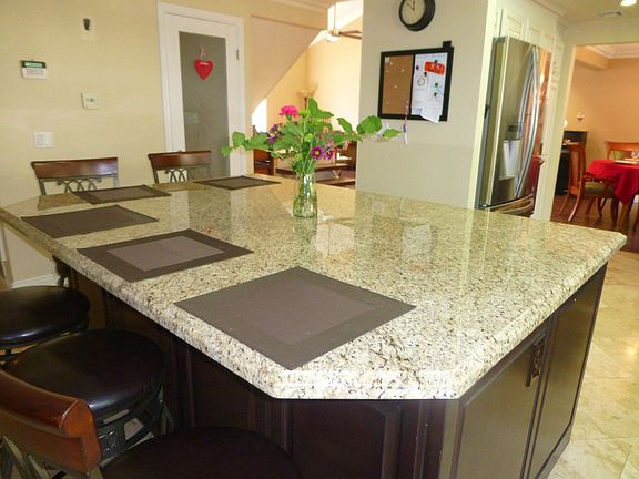 Kitchen Granite Island w/ lots of storage!