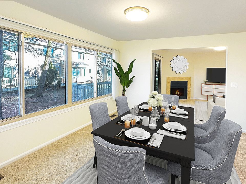 Spacious townhome near Franklin with spacious interior, living room with fireplace, unusually large dining room.