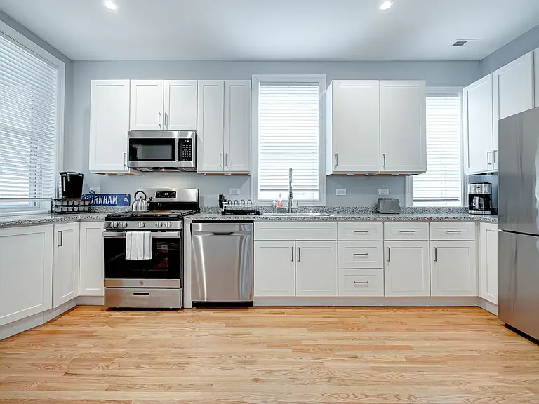 spacious kitchen with extraordinary counter and cabinet space and stainless appliances
