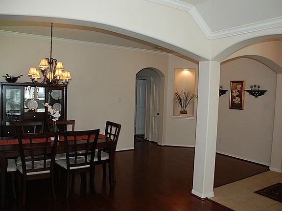 Formal living room & formal dining room w/high ceilings are great for entertaining or family gatherings