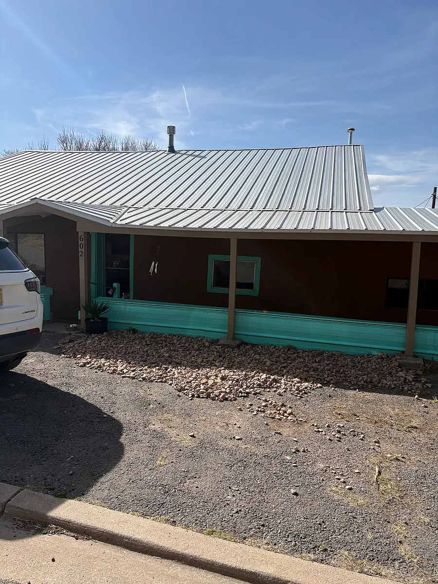 Freshly painted siding with gravel - 602 Stonewood Ave