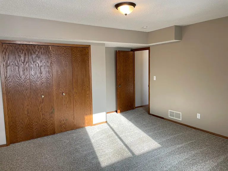 Lower-level 3rd bedroom