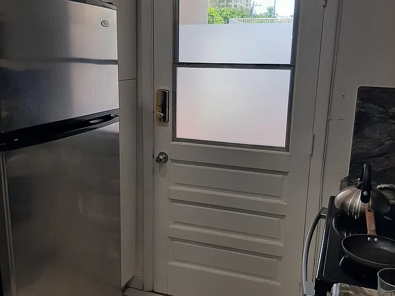 Kitchen area entrance with access to the parking lot.