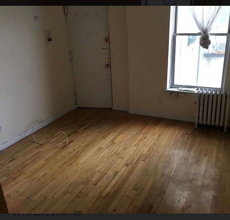 1st image of 114 E 1st St APT 21A