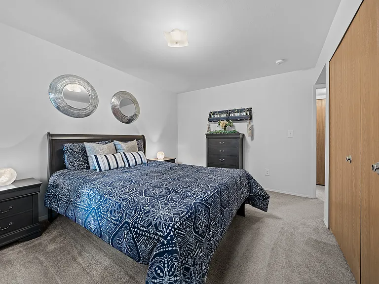 Spacious bedroom at Westwood Village Apartments in Westland, MI