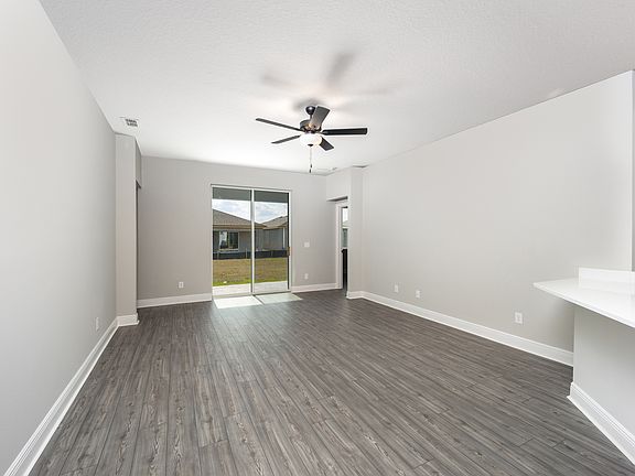 This family room opens to the backyard patio.
