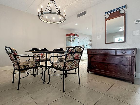 Dining area between the kitchen and living room.