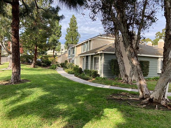 Single story end unit with plenty of green space.