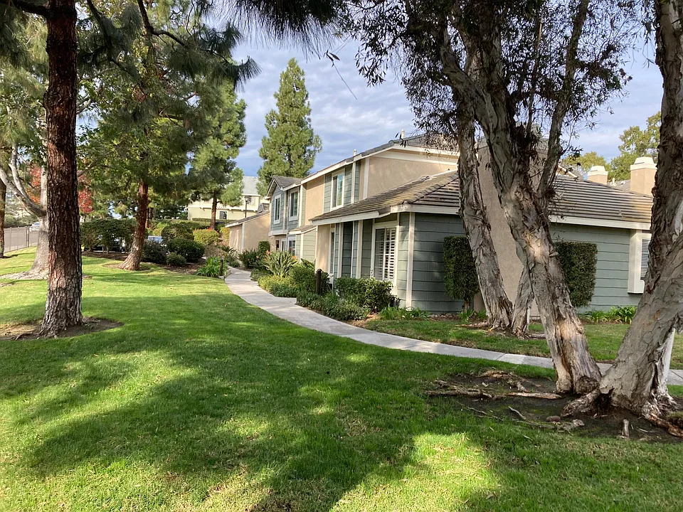 Single story end unit with plenty of green space.