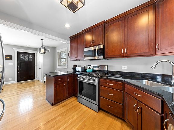 Super sharp, dark granite counters, SS appliances