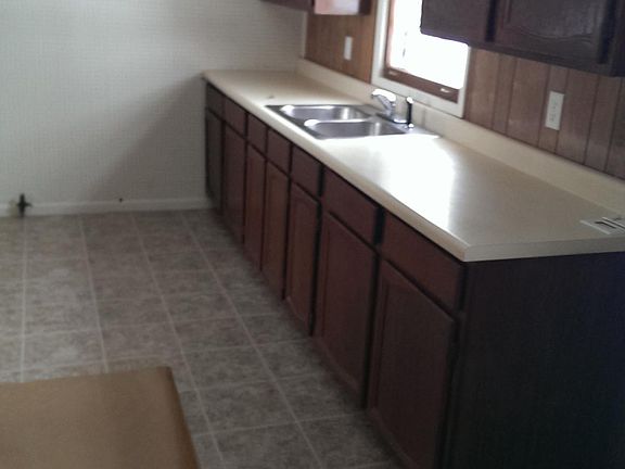 Kitchen window overlooks big back yard!