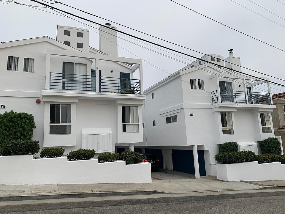 Front of building; townhouse units with attached 2 car garages with automatic openers and washer/dryer hookups