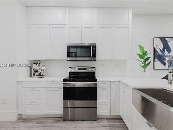 5th image of 12735 SW 49th Ct #Townhouse 12735