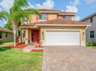 811 Palm Tree Ln, Haverhill, FL 33415